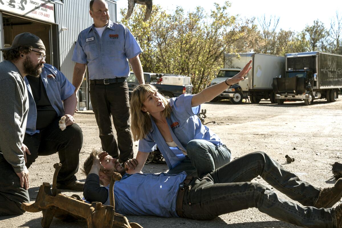 Taylor Kitsch as Glen Kryger, Carolina Bartczak as Lily Kryger in episode 101 of "Painkiller."