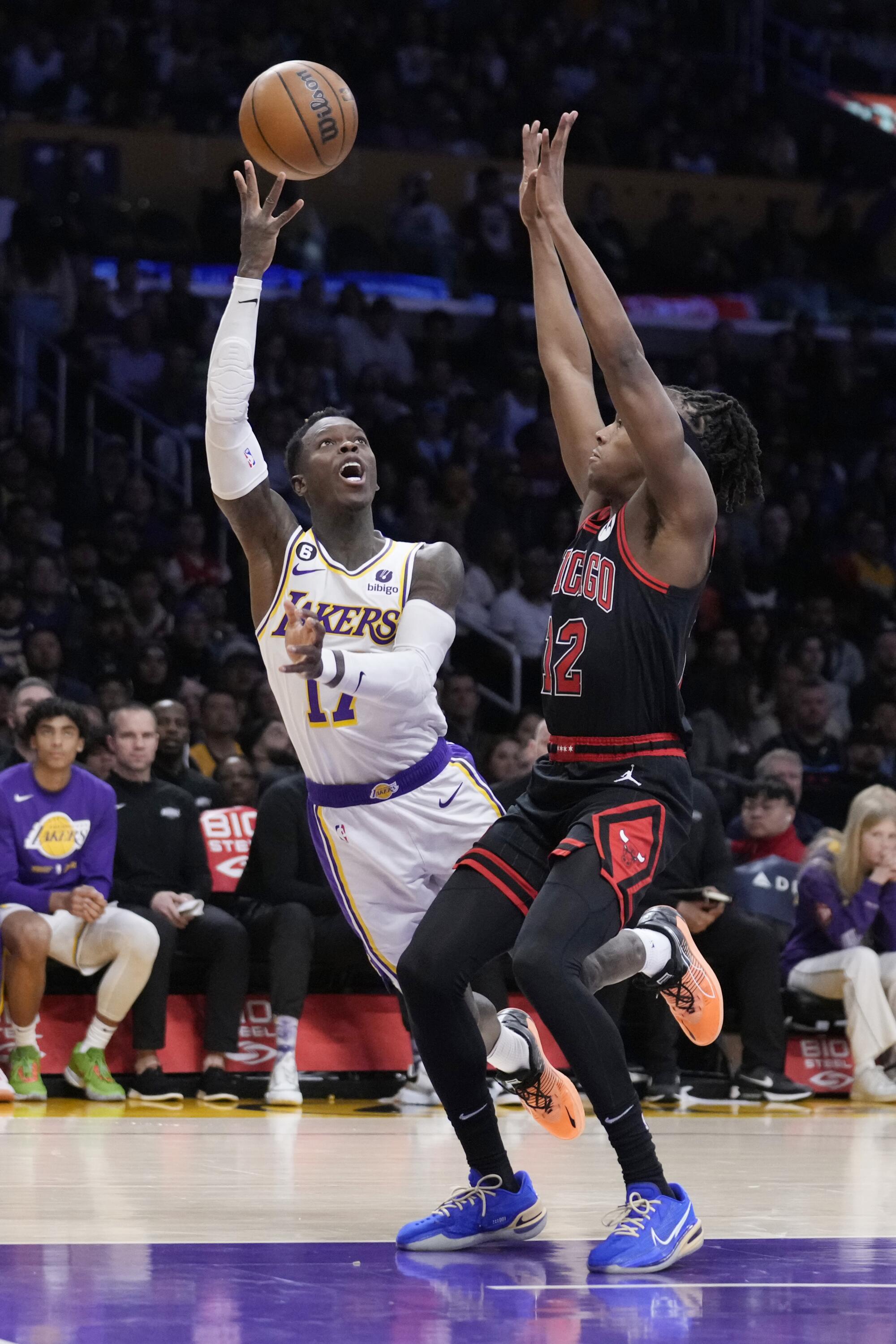 Dennis Schroder shoots over Chicago Bulls guard Ayo Dosunmu on March 26 at Crypto.com Arena.