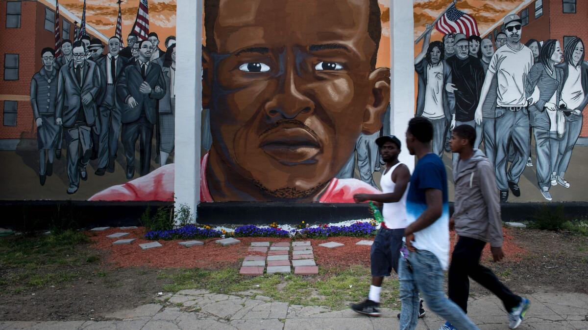 A mural of Freddie Gray adorns a wall in Baltimore.