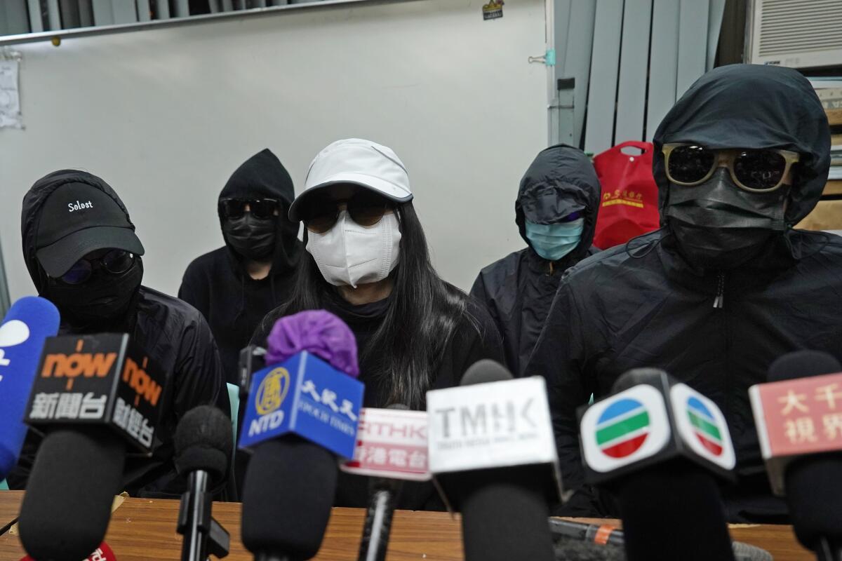 Relatives of 12 Hong Kong activists detained at sea by Chinese authorities