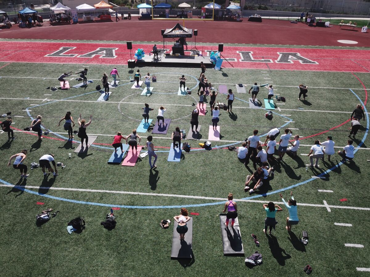 This family-friendly beWELL Fitness Fair features a fitness boot camp, yoga class (photo above from a previous event), local vendors, live entertainment and opportunity drawing for guests to enjoy.