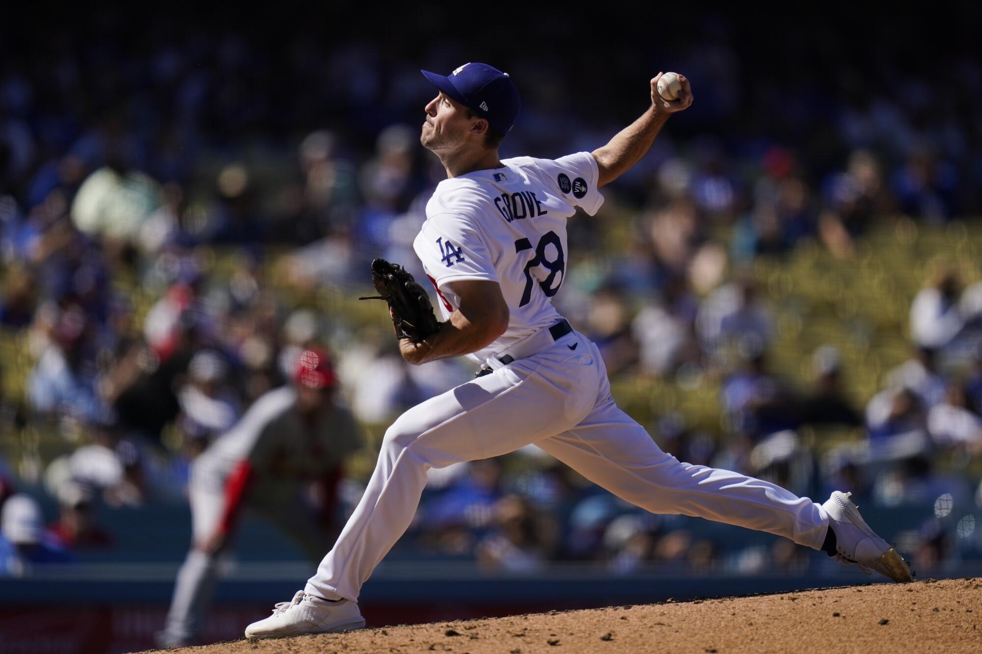 Dodgers starting pitcher Michael Grove delivers against the St. Louis Cardinals.