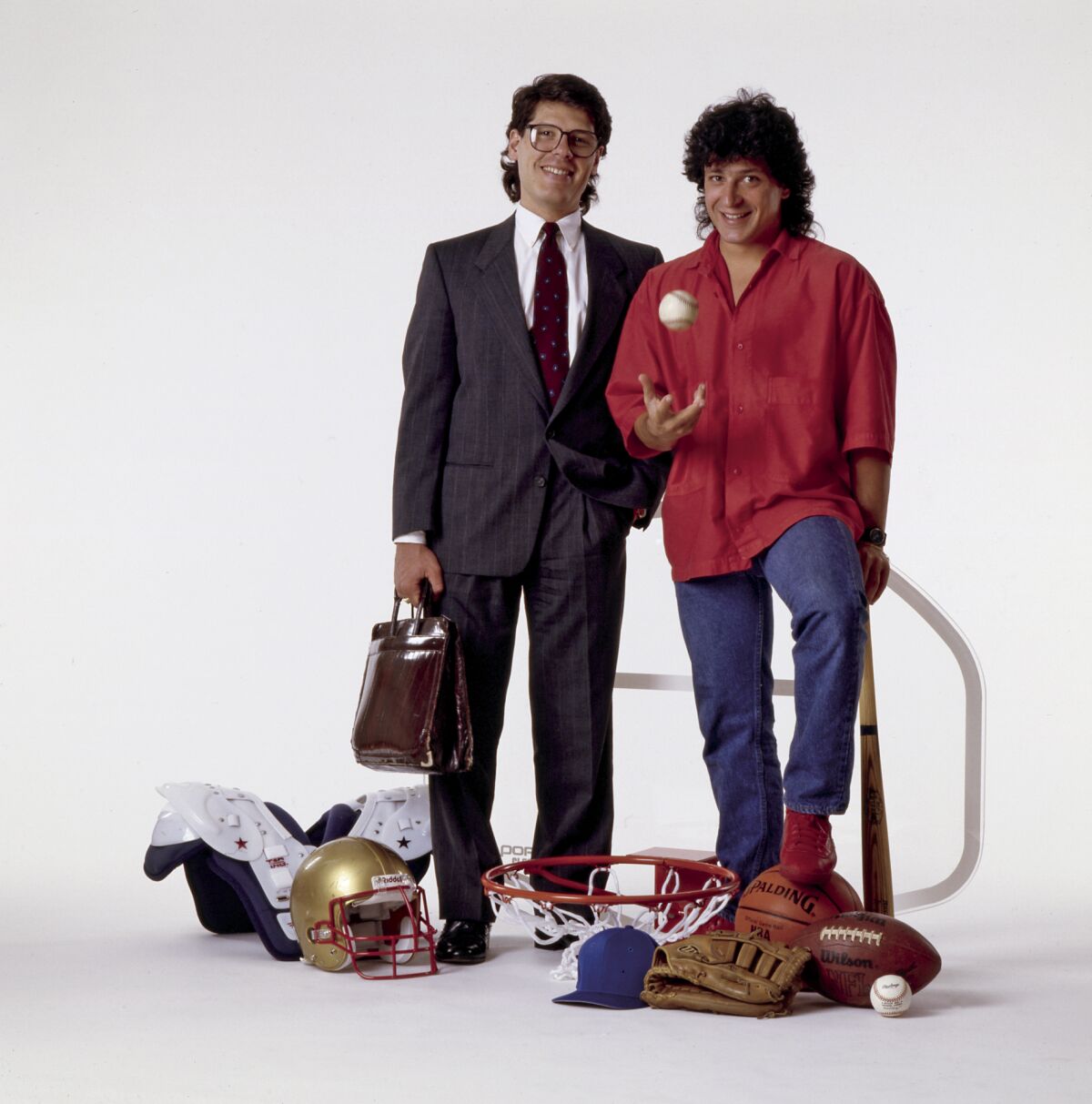 Tock, left, and John Costacos started a sports poster business in the 1980s.