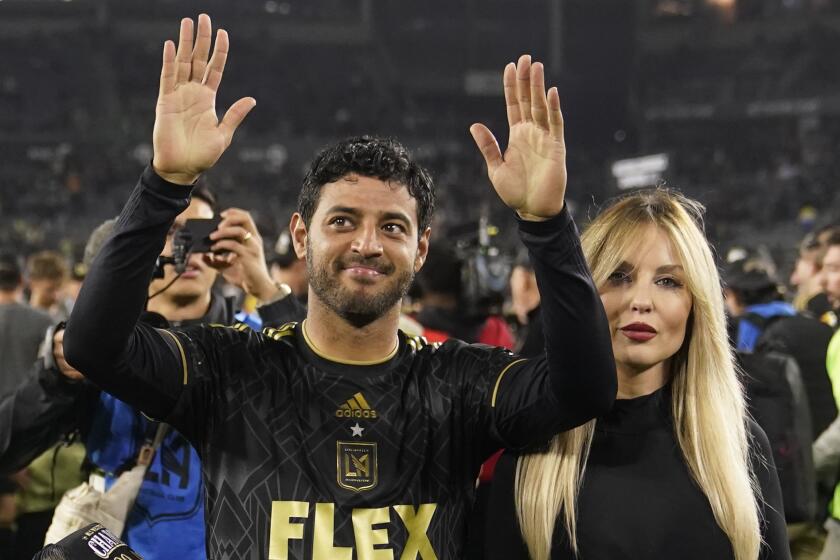 Los Angeles FC forward Carlos Vela celebrates alongside his wife, Saioa Ca?ibano.