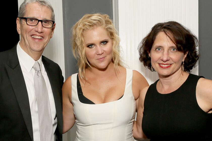 Amy Schumer, center, with Viacom Music & Entertainment Group President Doug Herzog and Comedy Central President Michele Ganeless at the network's Emmy after-party at Boulevard3 in Hollywood.