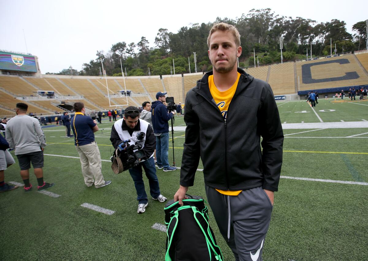 Cal Bears quarterback Jared Goff walks on the sidelines.