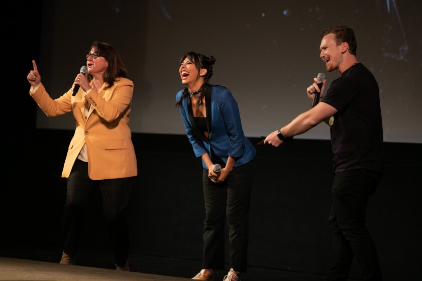 HOLLYWOOD, CA - MAY 05: Xochitl Gomez (center), the actor who plays America Chavez in Doctor Strange In the Multiverse of Madness", makes an appearance at the El Capitan Theater on Thursday, May 5, 2022 in Hollywood, CA. (Jason Armond / Los Angeles Times)