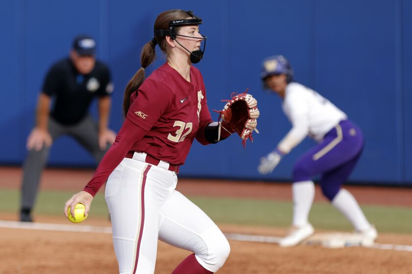 Florida State's Kathryn Sandercock pitches against Washington during the second inning of an NCAA softball Women's College World Series game Saturday, June 3, 2023, in Oklahoma City. (AP Photo/Nate Billings)