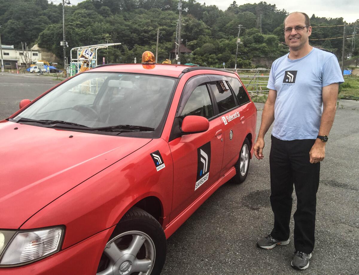 Joe Moross has driven 90,000 miles gathering data for Safecast. A Geiger counter equipped with a GPS module hangs from the back window of his station wagon.