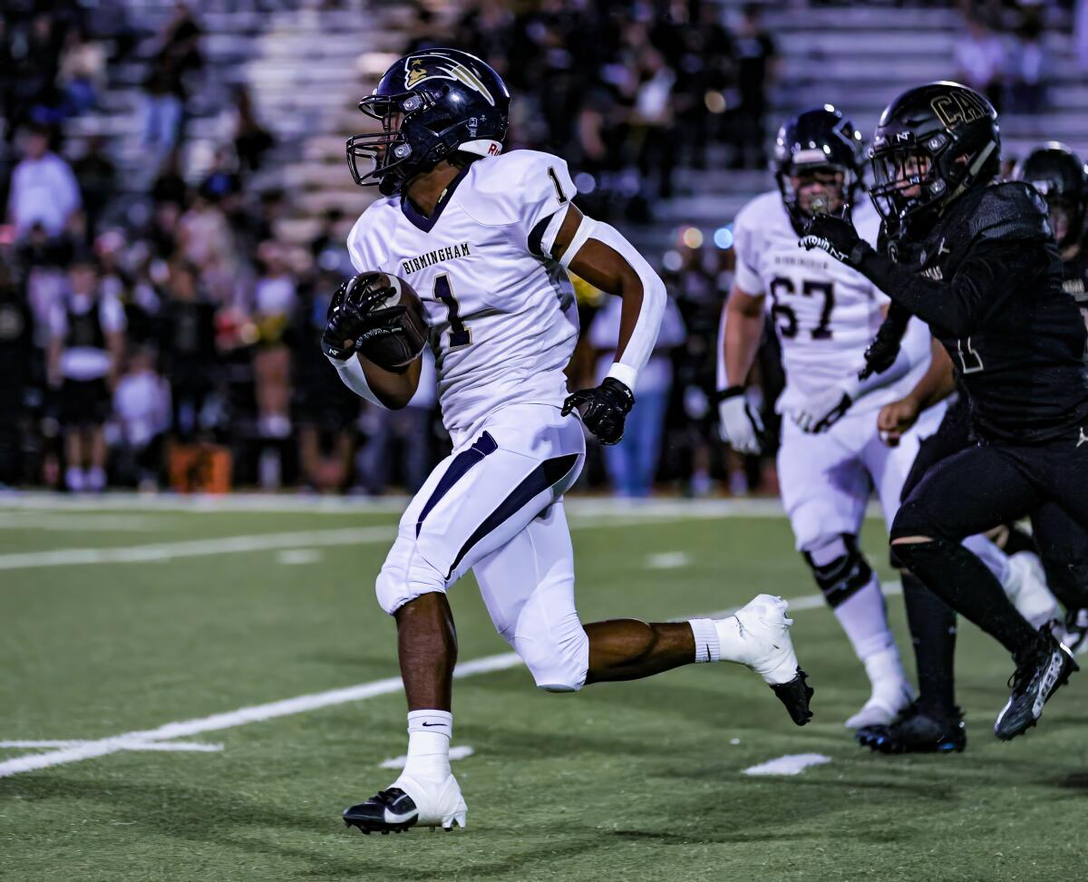 Dredon Fowles of Birmingham takes off on an 80-yard touchdown run on the first play against Calabasas on Friday night.