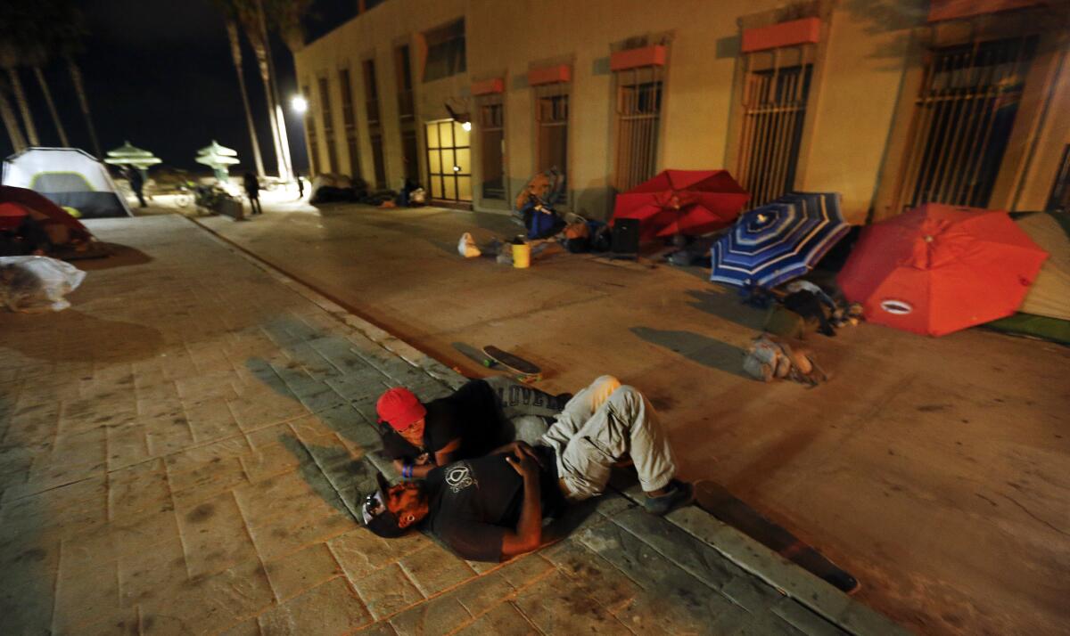 Homeless people on the street in Venice.