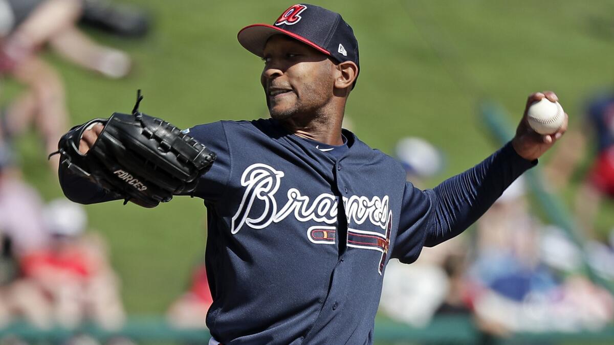 Sam Freeman pitches against the Washington Nationals in the third inning of a spring training game on Feb. 25, in Kissimmee, Fla.