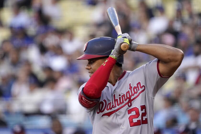 Washington Nationals' Juan Soto bats during the first inning of a baseball game pagainst the Los Angeles Dodgers Monday, July 25, 2022, in Los Angeles. (AP Photo/Mark J. Terrill)