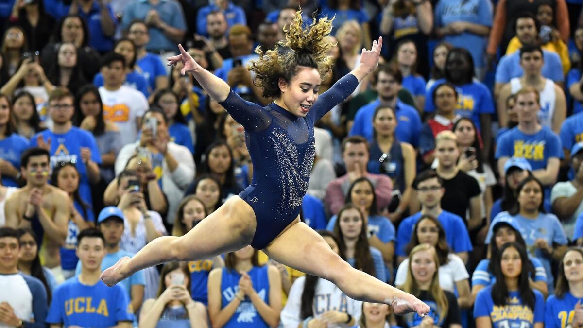 UCLA's Katelyn Ohashi gets a perfect score on the floor exercise during competition against Utah St. at Pauley Pavillion.