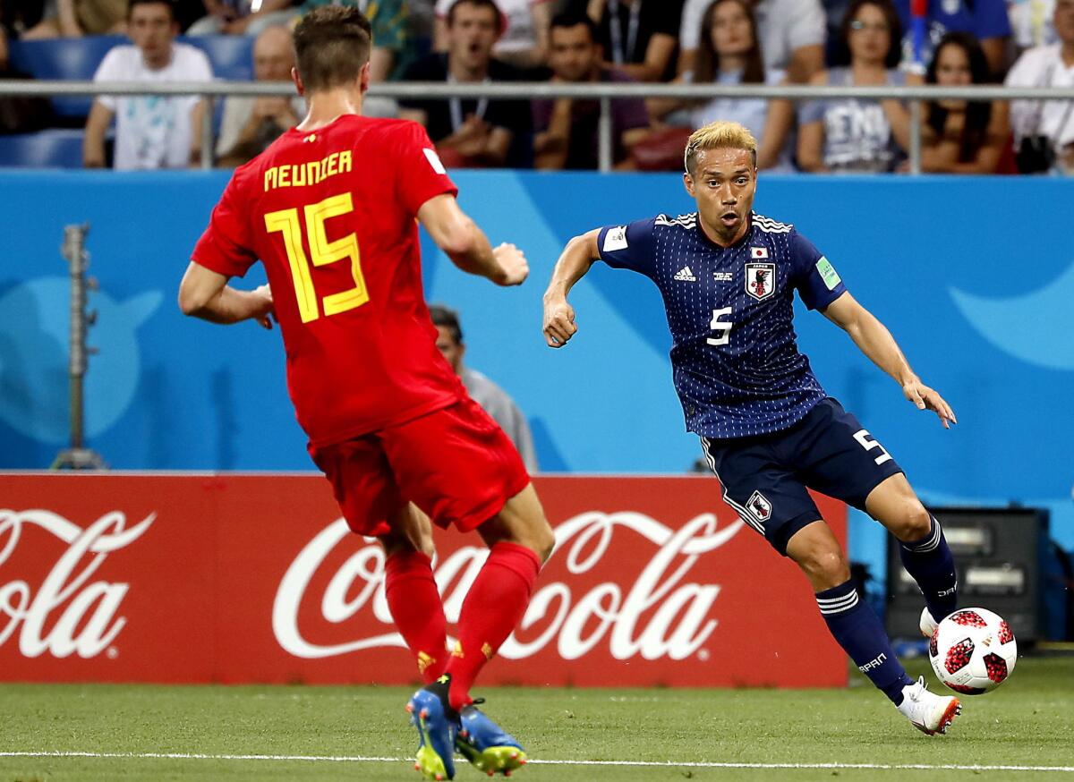 Yuto Nagatomo of Japan (R) and Thomas Meunier of Belgium in action during the FIFA World Cup 2018 round of 16 soccer match between Belgium and Japan in Rostov-On-Don, Russia, 02 July 2018.