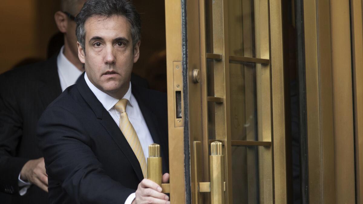 Michael Cohen leaves court in New York in August.