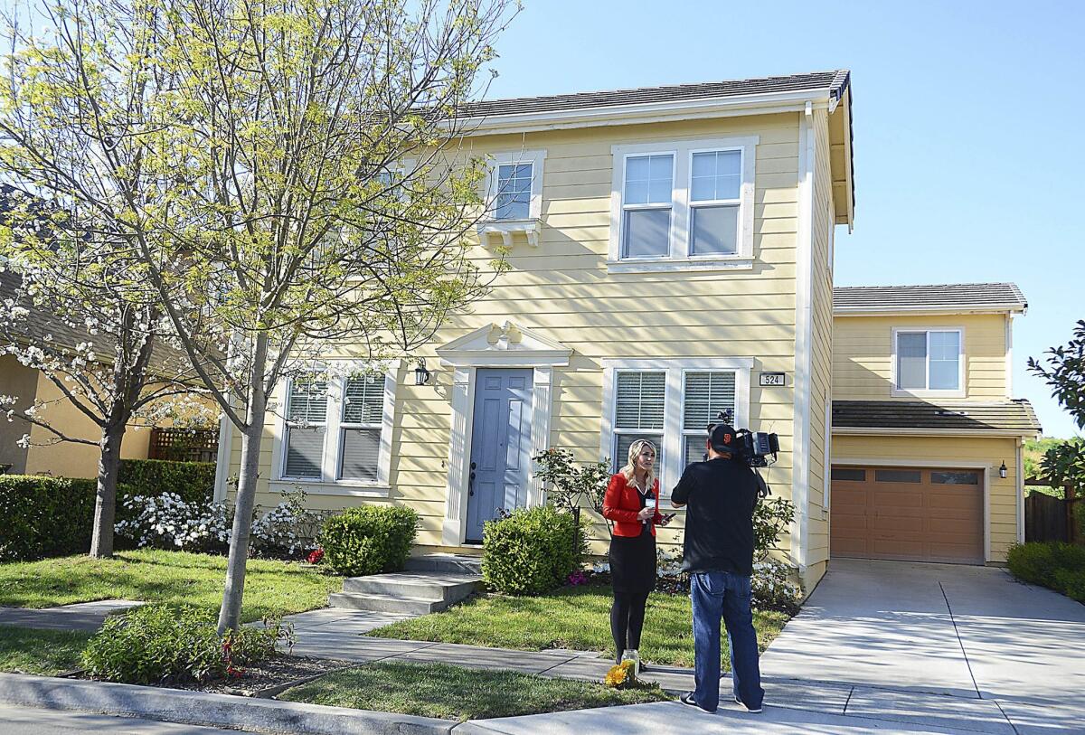 A news crew reports on the abduction of Denise Huskins in front of her Vallejo, Calif., home in March.