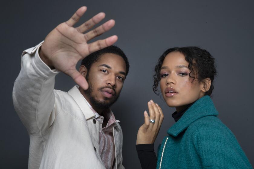 LOS ANGELES, CALIF. -- FRIDAY, OCTOBER 25, 2019: ‘‘Waves’ cast members Kelvin Harrison Jr., left, and Taylor Russell, right, sit for portraits at the Four Seasons Los Angeles at Beverly Hills hotel in Los Angeles, Calif., on Oct. 25, 2019. (Brian van der Brug / Los Angeles Times)