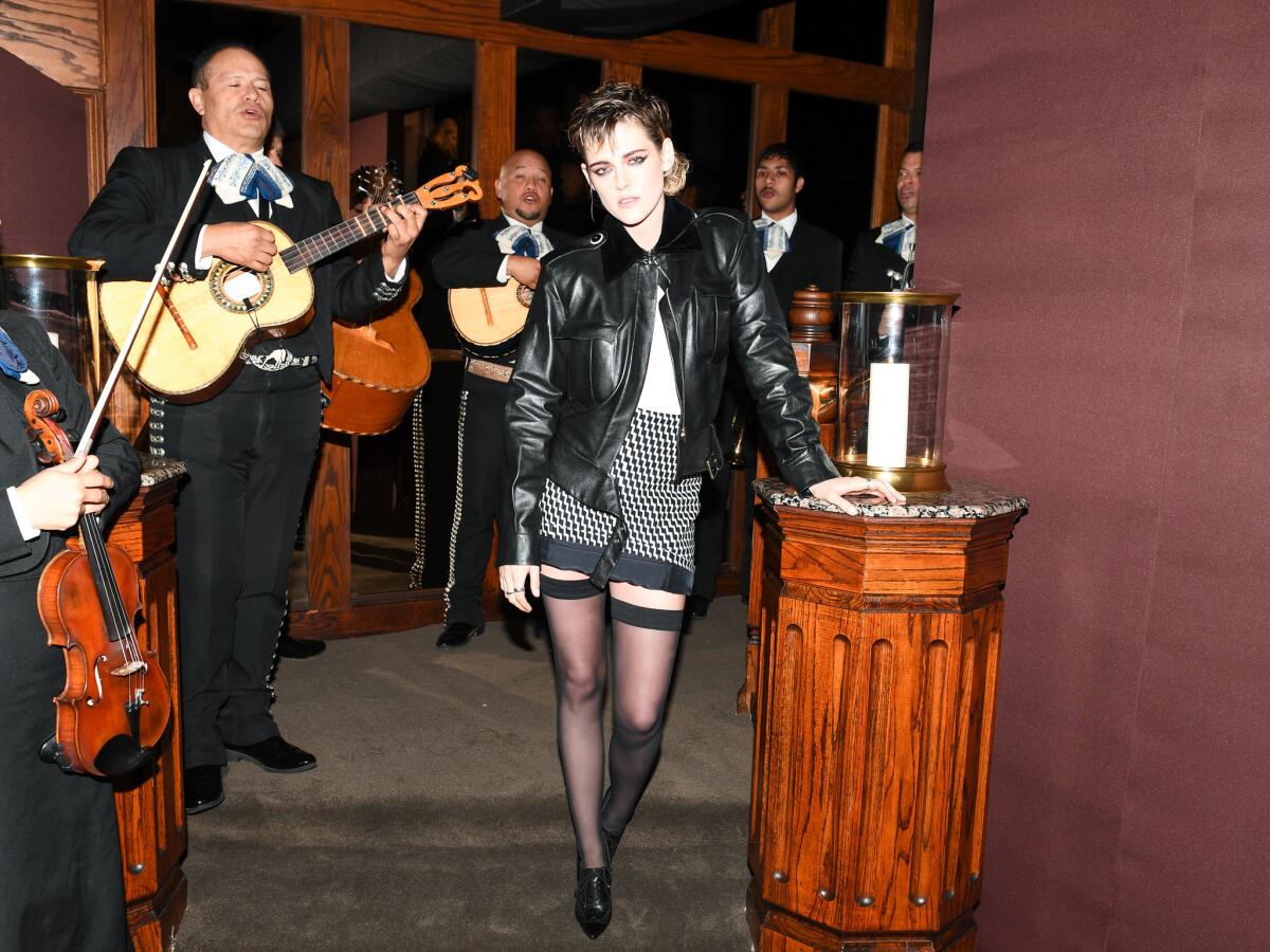 Kristen Stewart wears Chanel at the dinner co-hosted by the French brand.