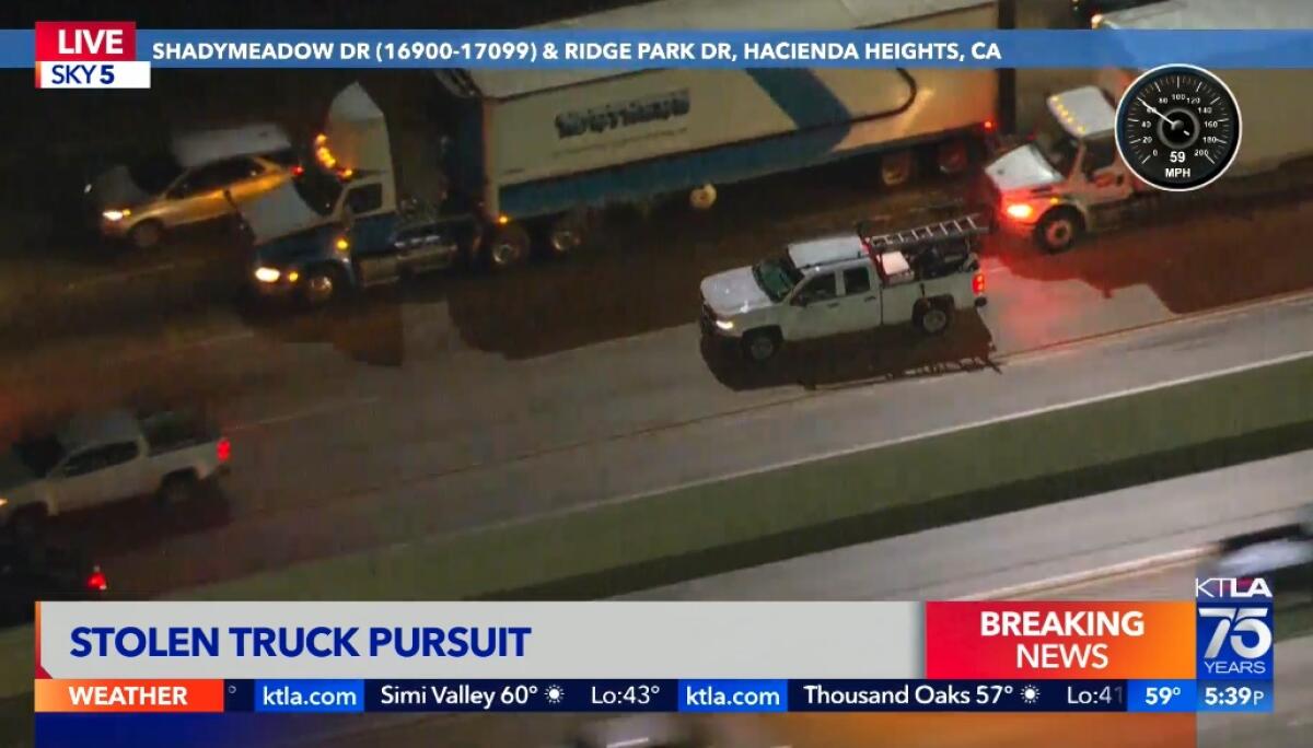 A screenshot shows vehicles on a freeway at night.