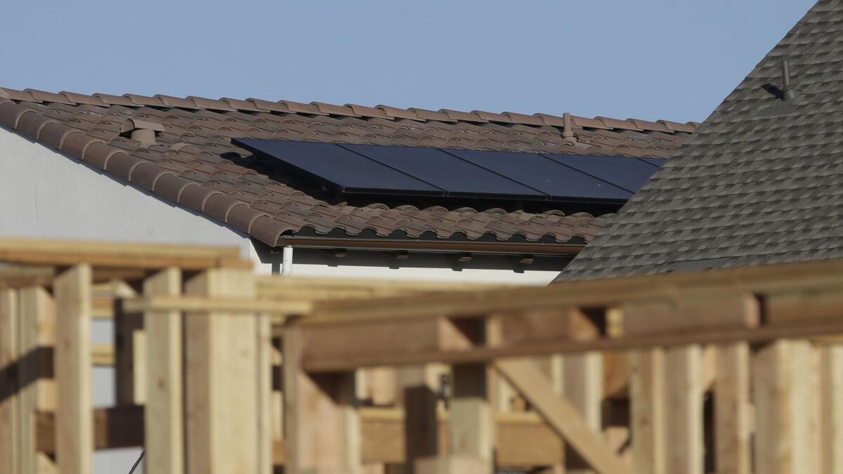 Solar panels on the roof on a home in a new housing project in Sacramento.