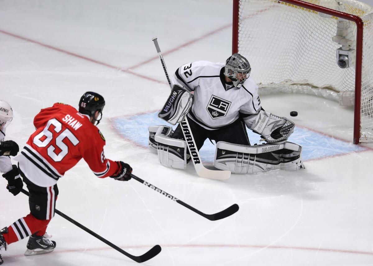 Blackhawks right wing Andrew Shaw beats Kings goalie Jonathan Quick with a low shot early in the first period of Game 2.