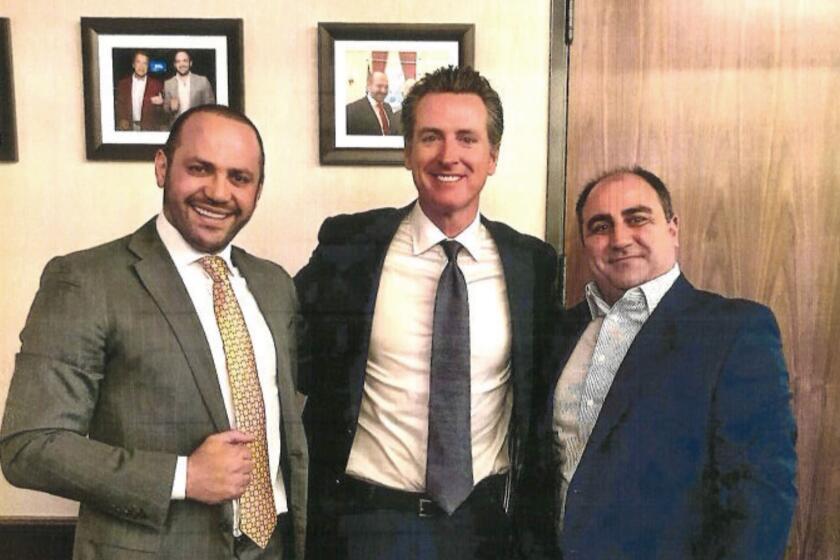 U.S. District Court exhibit shows Edgar Sargsyan and John Balian posing with Gavin Newsom