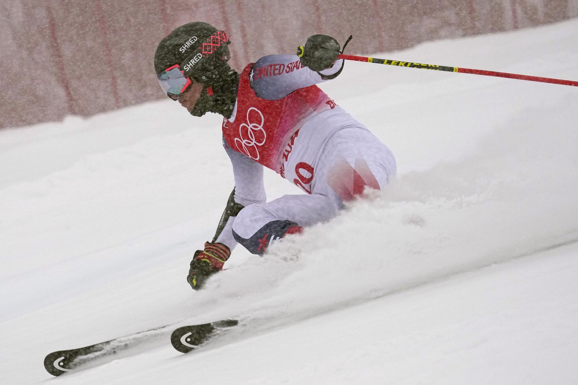 U.S. skier Tommy Ford takes part in the first run of the men's giant slalom at the 2022 Winter Olympics.