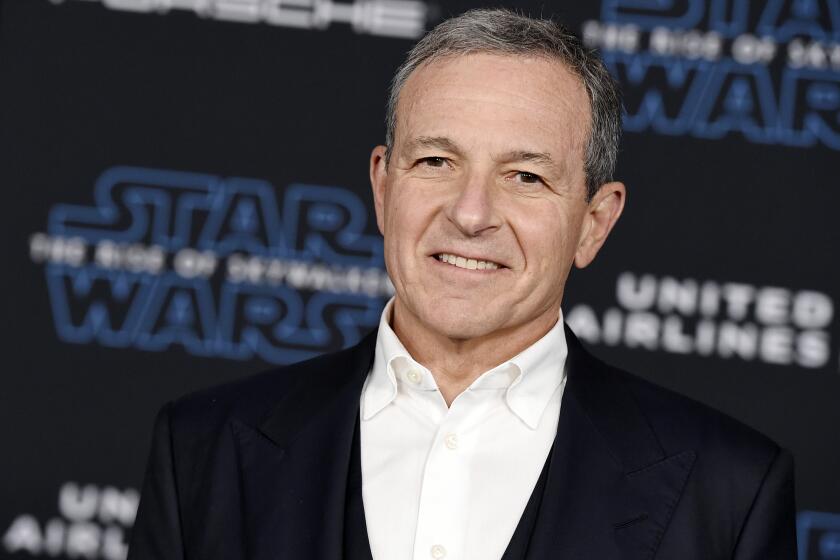 FILE - In this Dec. 16, 2019, file photo, Disney CEO Robert Iger arrives at the world premiere of "Star Wars: The Rise of Skywalker", in Los Angeles The Walt Disney Co. has named Bob Chapek CEO, replacing Bob Iger, effective immediately, the company announced Tuesday, Feb. 25, 2020. (Jordan Strauss/Invision/AP, FIle)