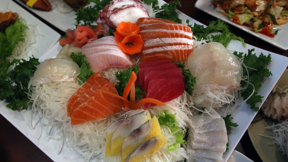 Chung Hae Jin's sashimi is fresh from the tank.