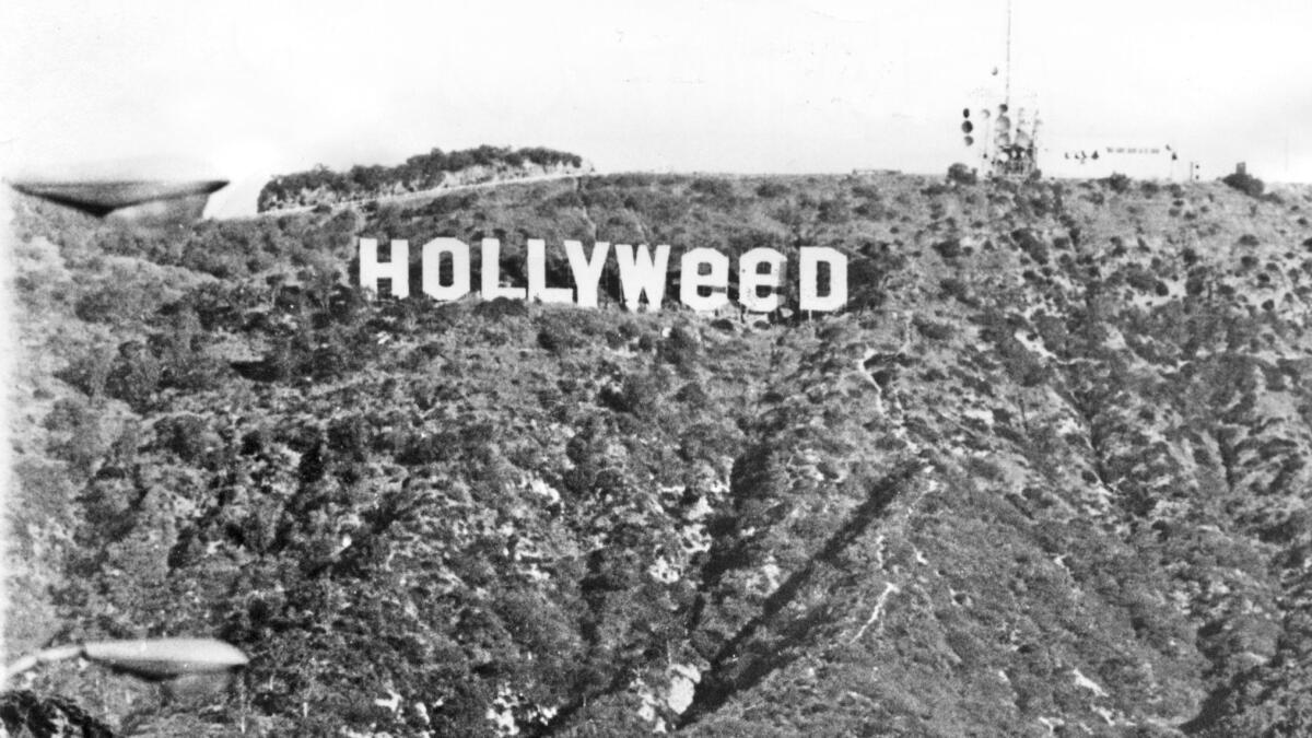 A 1976 image shows the time the Hollywood sign was altered by then-Cal State Northridge student Daniel Finegood as his project for an art class assignment on working with scale. (He earned an A.)