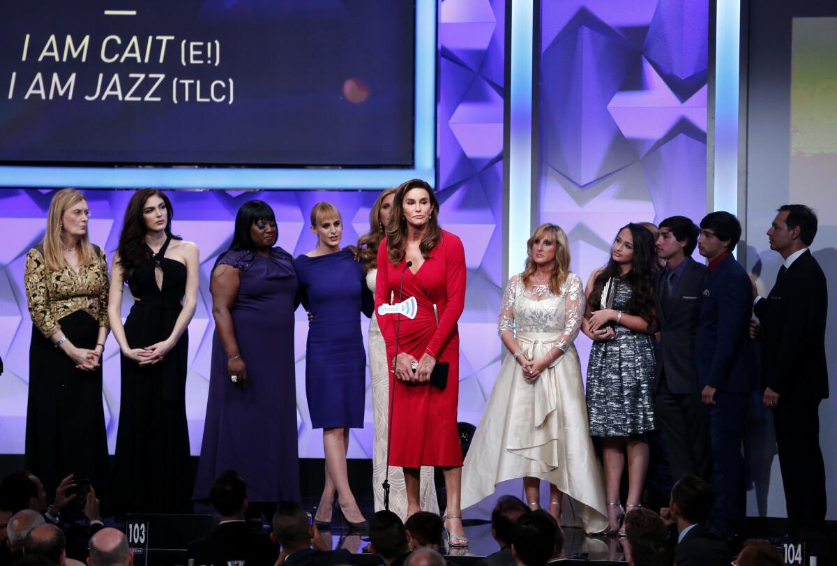 The casts of "I Am Cait" and "I Am Jazz" accept the award for outstanding reality program onstage during the 27th GLAAD Media Awards.
