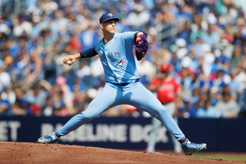 TORONTO, CANADA - AUGUST 24: Bowden Francis #44 of the Toronto Blue Jays pitches.