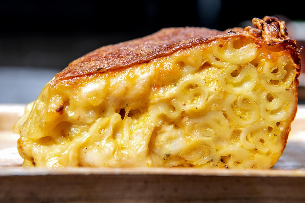 A wedge of mac and cheese from Bridgetown Roti
