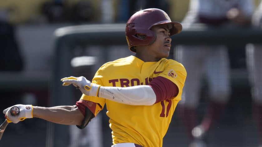 FILE - Southern California's Tyresse Turner (10) swings during an NCAA baseball game against Santa Clara on Sunday, Feb. 20, 2022, in Los Angeles. Southern California, the blueblood baseball program that hasn't been much of a factor nationally for two decades, is showing signs of re-emerging. (AP Photo/Kyusung Gong, File)