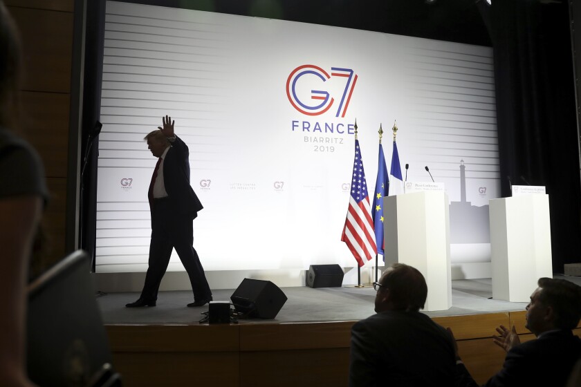 President Trump walks off stage after taking questions at the G7 in France. 