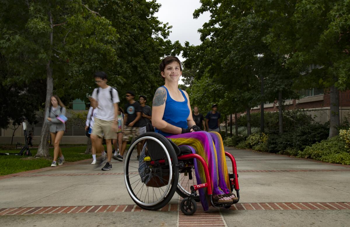 Kat Kath, a computer programmer at UCLA, uses a wheelchair to get around campus. 