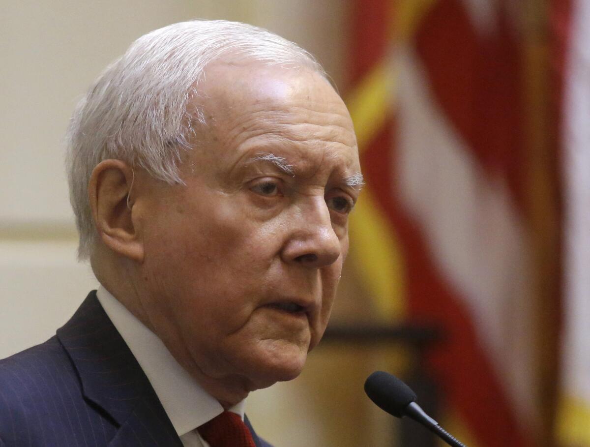 In this Feb. 19 photo, Senate Finance Committee Chairman Sen. Orrin Hatch (R-Utah) speaks in Salt Lake City. Top lawmakers struck a bipartisan agreement on Thursday to allow President Barack Obama to negotiate trade deals subject to a yes-or-no vote from Congress without the possibility of changes. The "fast-track" legislation comes as Obama seeks a sweeping trade deal with 11 Pacific nations.