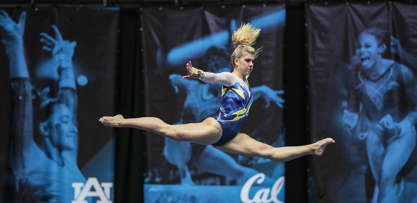 UCLA's Pauline Tratz competes in the floor exercise Saturday night during the Bruins' season-opening meet at the Anaheim Convention Center.