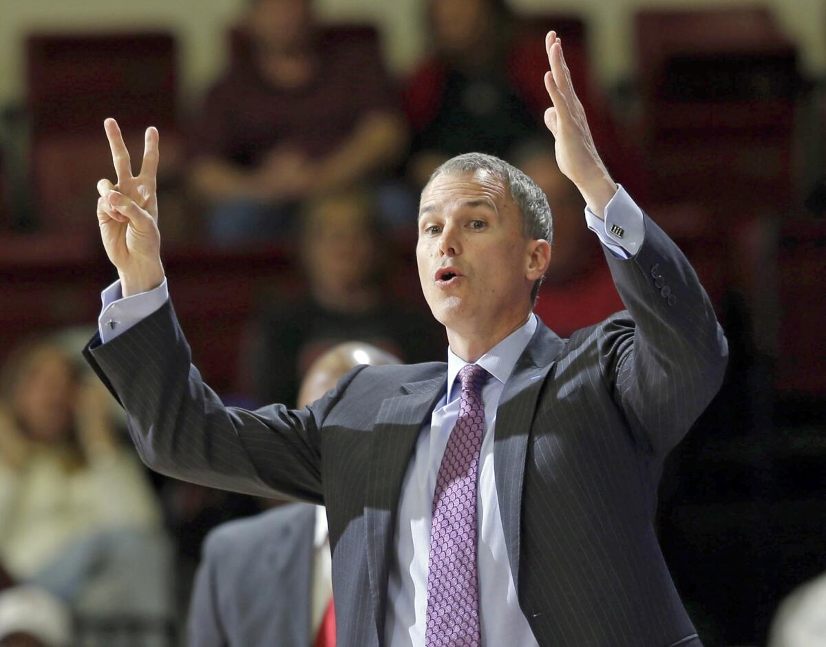 USC Coach Andy Enfield is in his second season at the helm of the Trojan basketball team. USC will play Cal State Los Angeles in an exhibition game Saturday at the Galen Center.