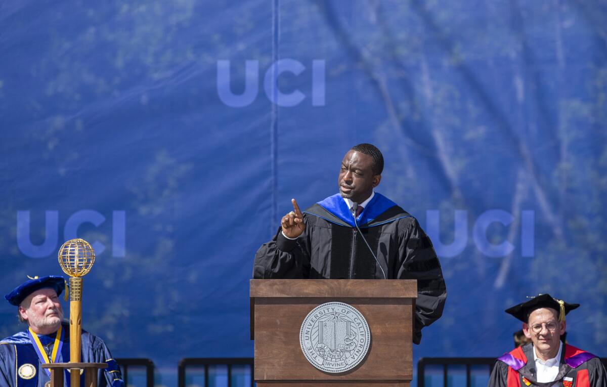 Dr. Yusef Salaam gives a speech during the UC Irvine commencement ceremony at Angel Stadium.