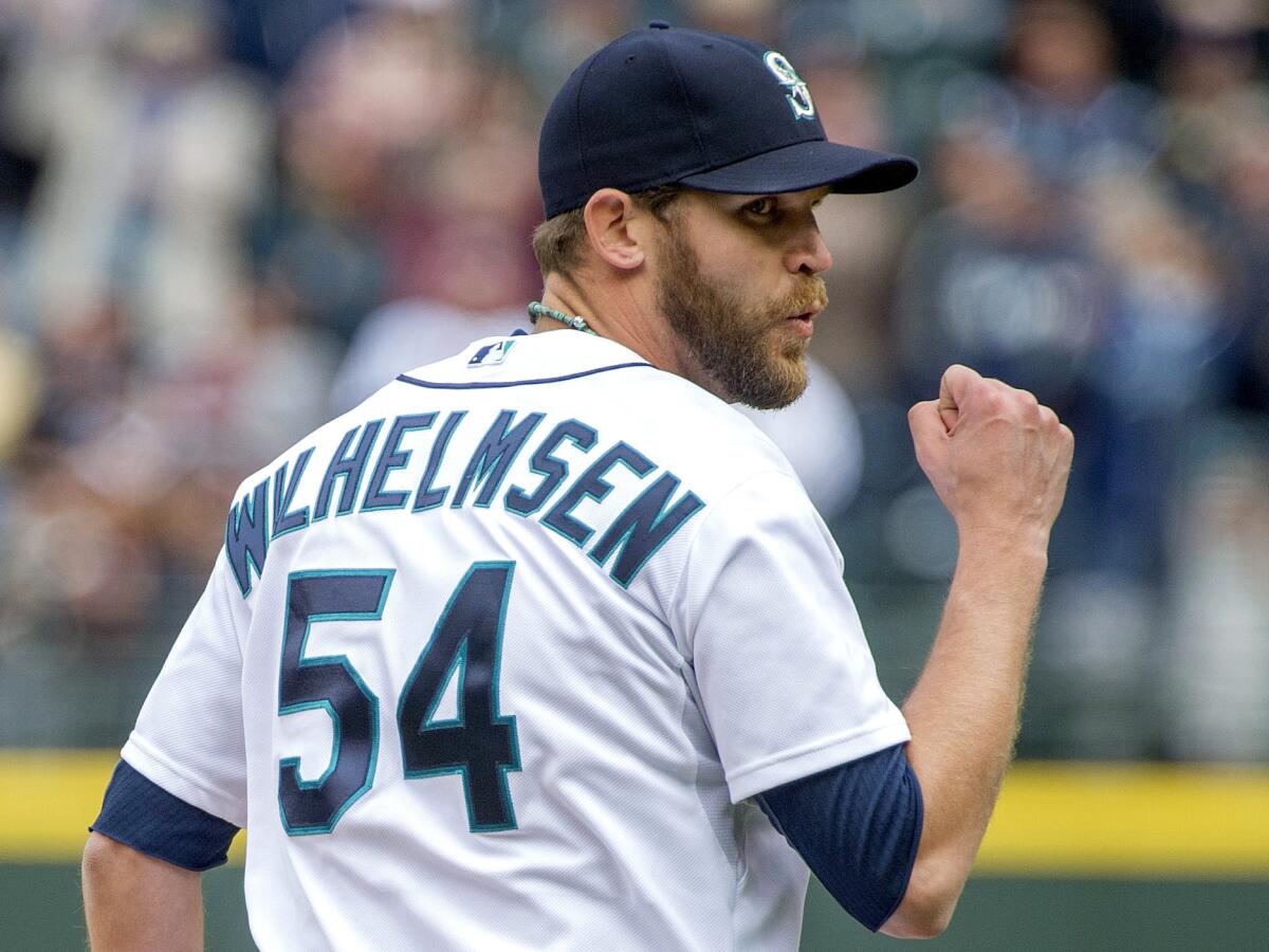 Seattle Mariners closer Tom Wilhelmsen reacts to an out during the ninth inning against the Angels in April.