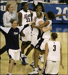 Connecticut guard Ashley Valley, front left, runs toward guard Diana Taurasi (3) as the Huskies celebrate their 71-69 win. Behind Valley and Taurasi are, from left, Nicole Wolff, Barbara Turner (33), Ashley Battle, Maria Conlon and Jessica Moore.