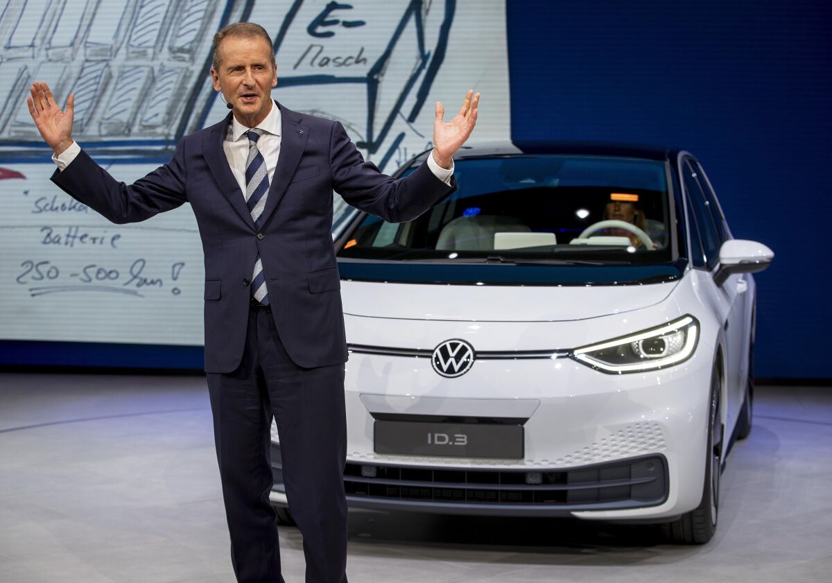 FILE - In this Monday, Sept. 9, 2019, file photo, CEO of Volkswagen Herbert Diess introduces the new VW ID.3 at the IAA Auto Show in Frankfurt, Germany.(AP Photo/Michael Probst, file)