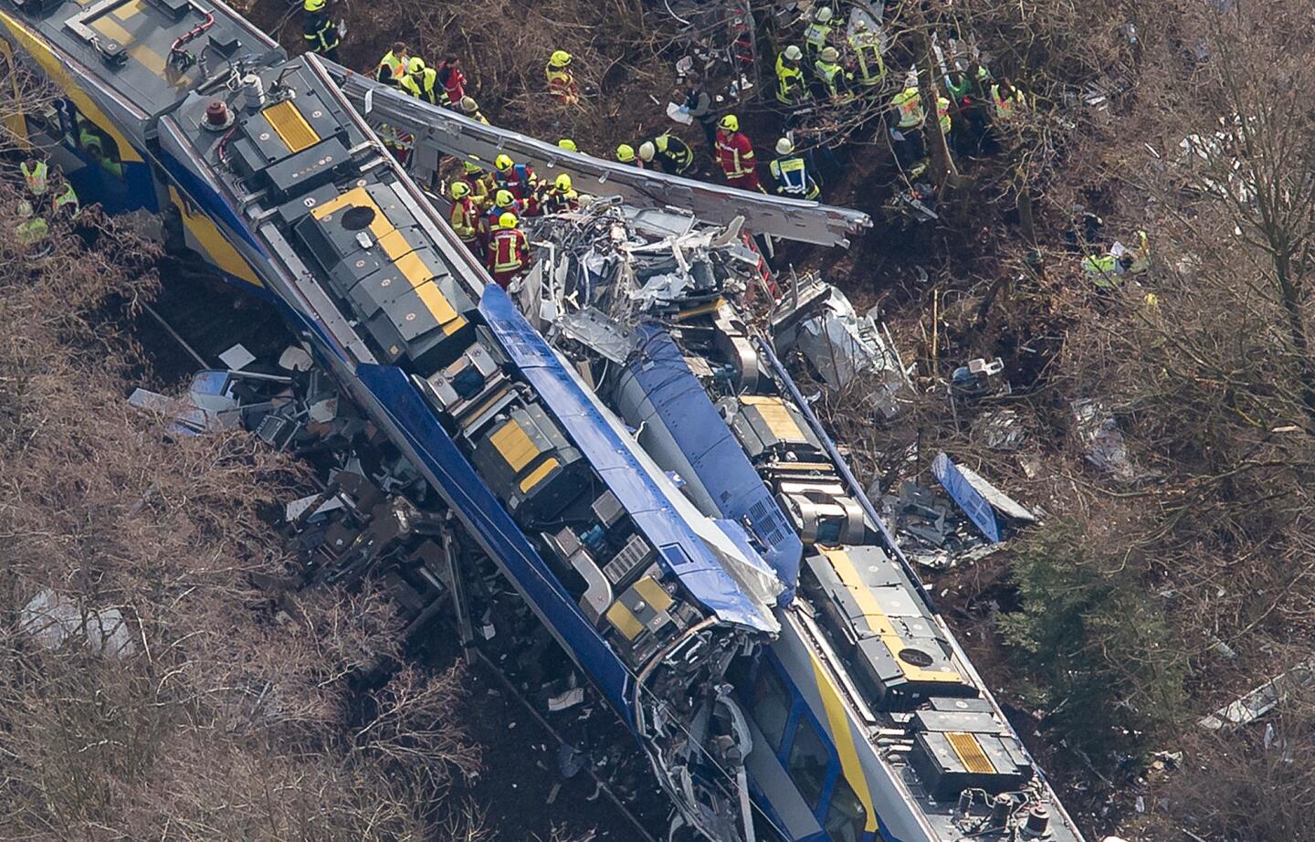 Aerial view of rescue forces working at the site of a train accident near Bad Aibling, Germany, Tuesday, Feb. 9, 2016. Several people were killed when two trains collided head-on.