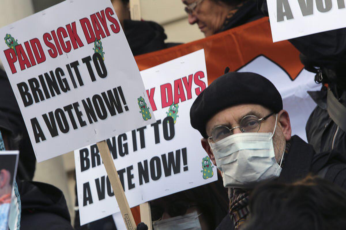 Portland became the fourth city to mandate employers provide sick leave to workers. Worker rights advocates have pushed for such measures in several U.S. cities. Above, activists rally in January at New York's City Hall for paid sick leave.