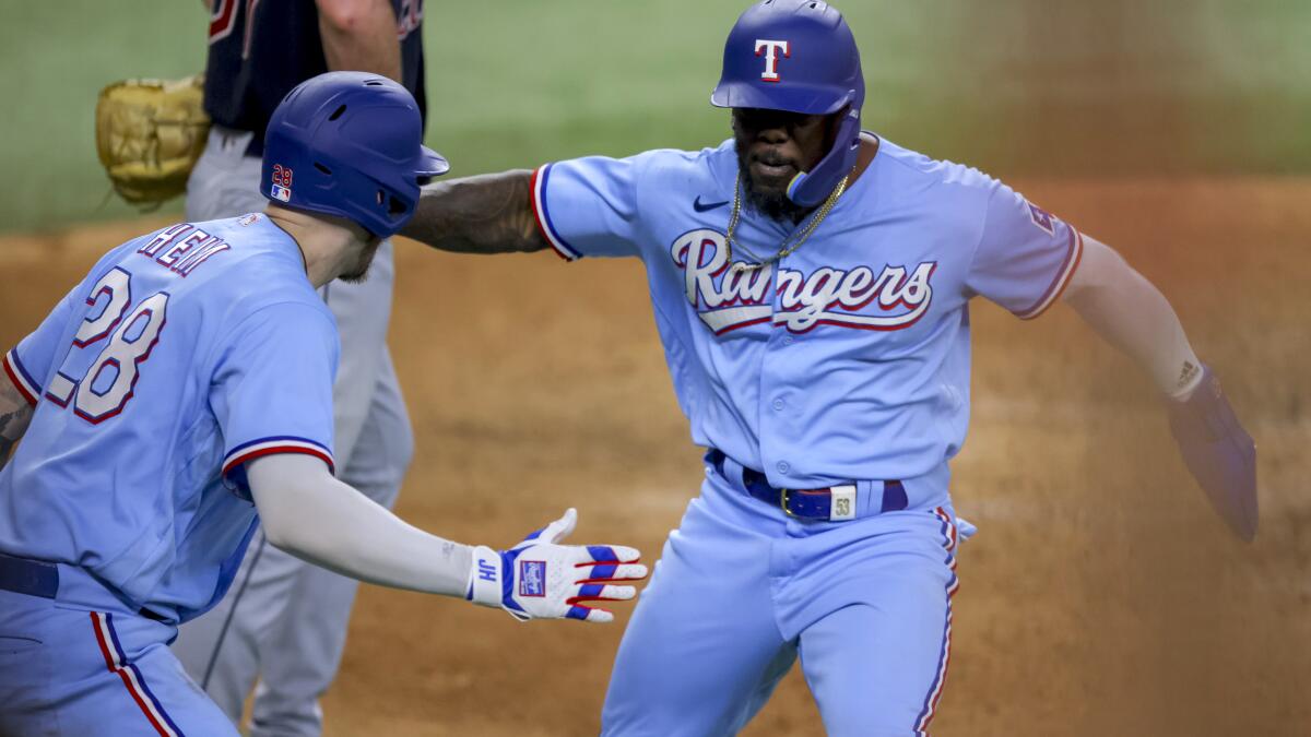 Rangers score five in 8th, come back to nip A's 8-6 - The San Diego  Union-Tribune