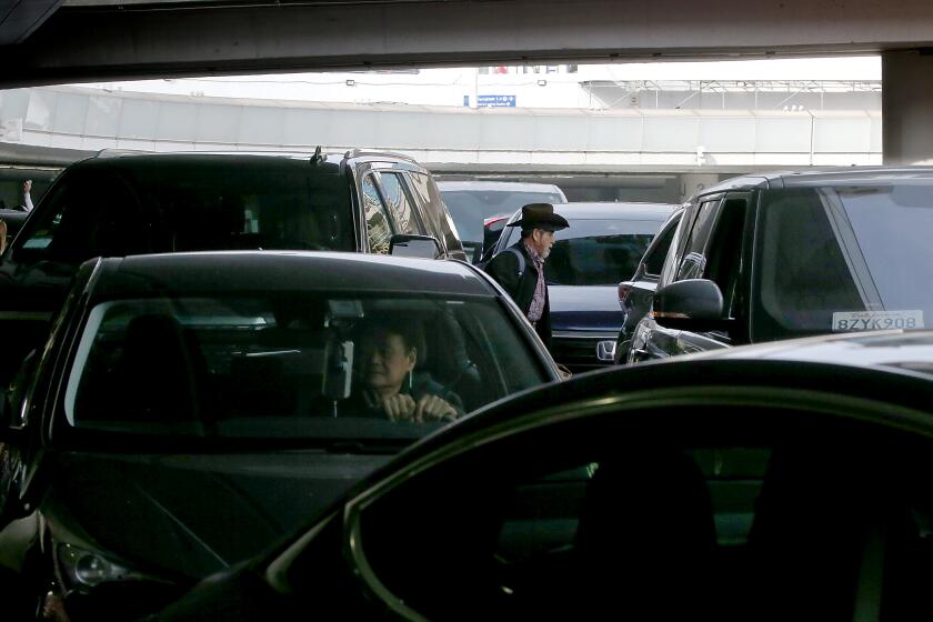 Los Angeles, CA - Motor traffic jams World Way at Tom Bradley International Terminal at LAX on Wednesday, Dec. 27, 2023. Travel experts say this weekend will produce a surge in air passengers as people head home from their holiday trips. (Luis Sinco / Los Angeles Times)