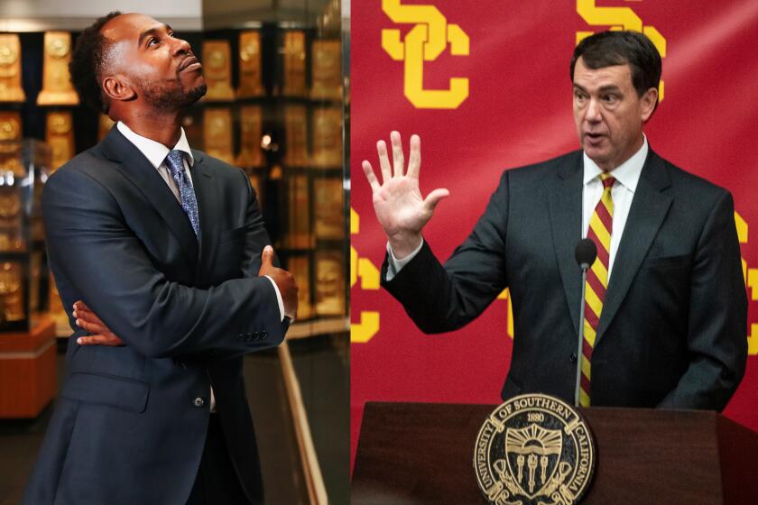 UCLA athletic director Martin Jarmond and USC athletic director Mike Bohn