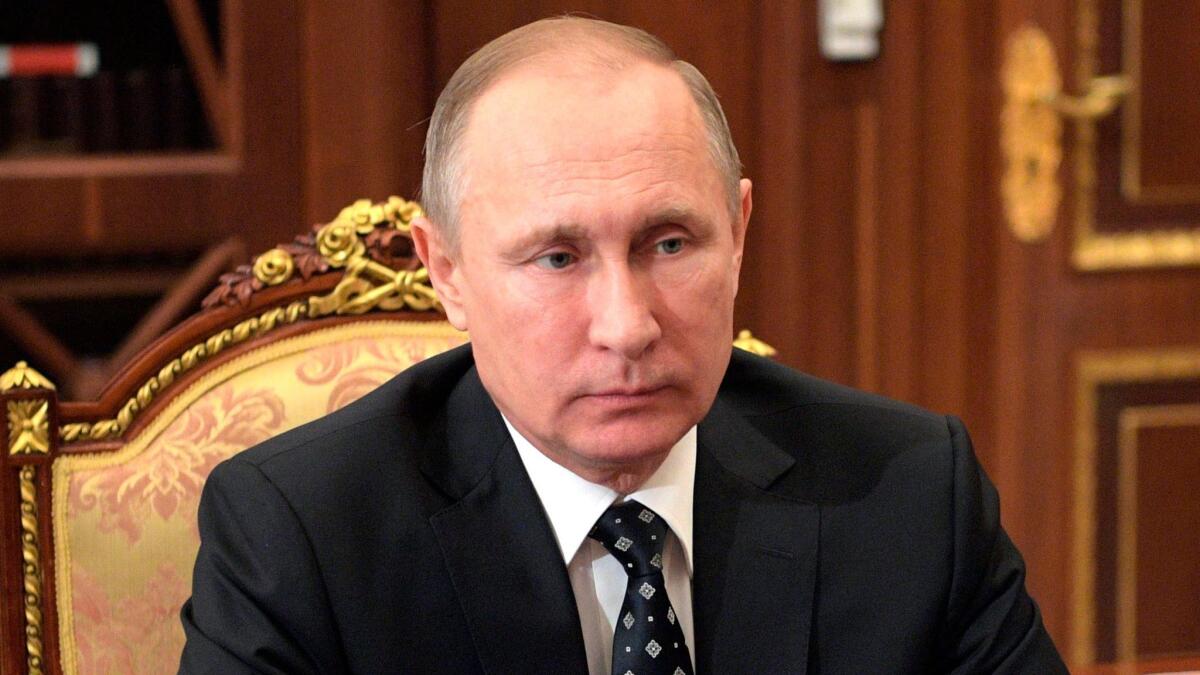 Russian President Vladimir Putin attends a meeting in the Kremlin in Moscow on Jan. 10.